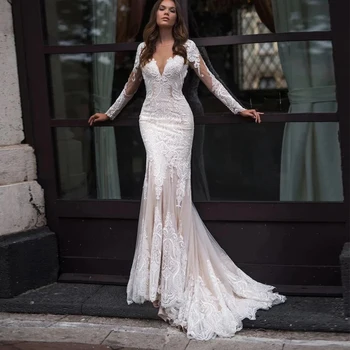 Modern Uzun Kollu Mermaid düğün elbisesi Tül Aplike Seksi Illusion Backless Gelin O-Boyun Elbiseler Düğme Robe De Mariée